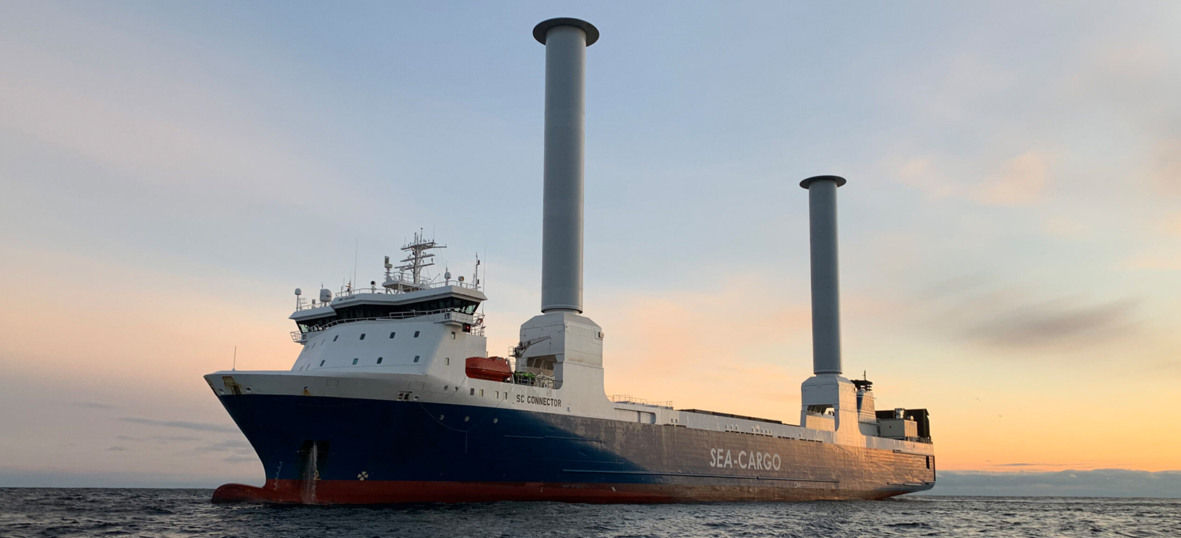 delivery man holding pile of cardboard boxes in front. copy space